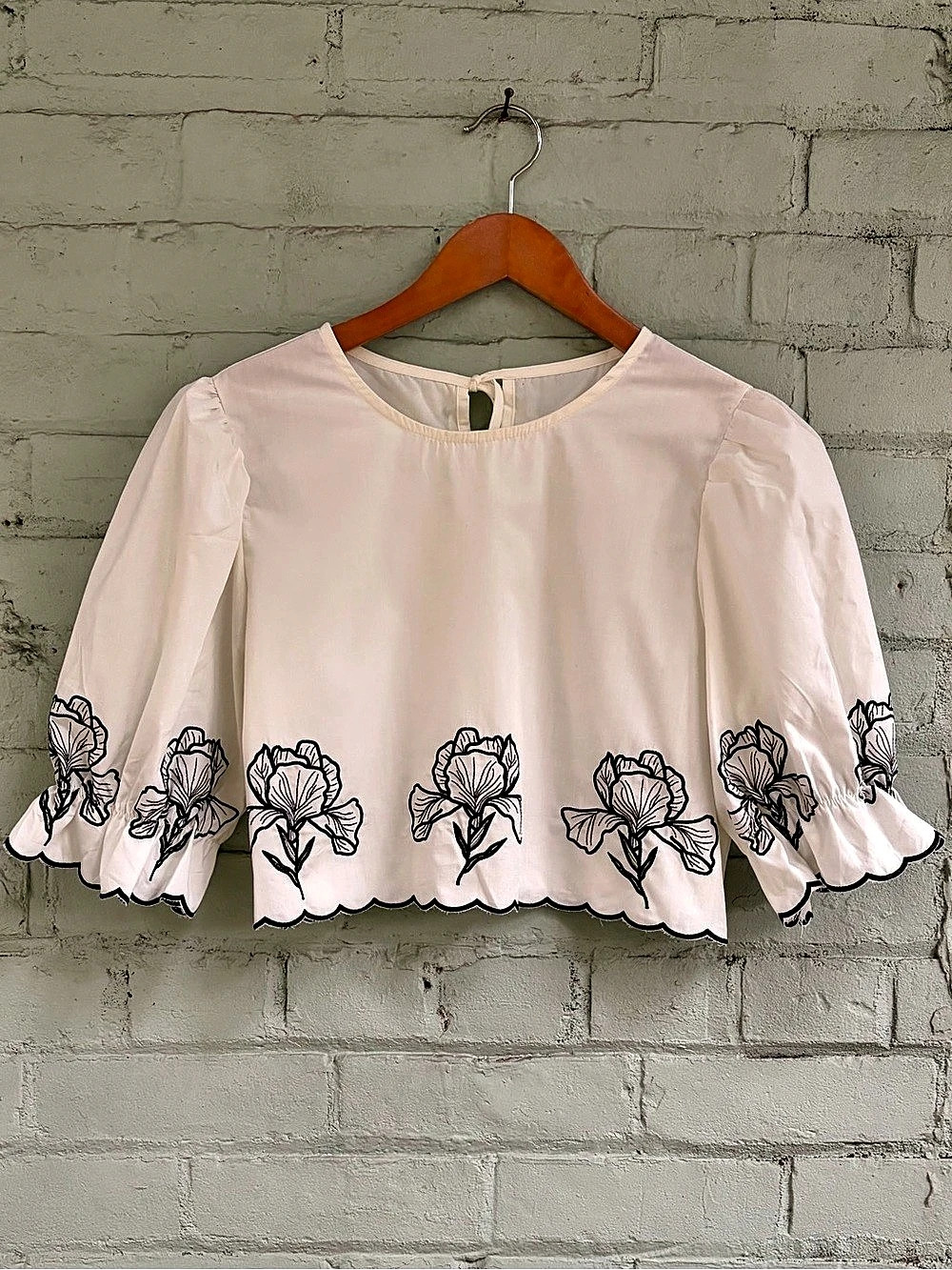 Floral Embroidered Cropped Puff Sleeve Blouse in White with Black Embroidery